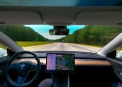 RALEIGH, NC USA, MAY 09, 2020: Person driving a new Tesla Model 3 on autopilot